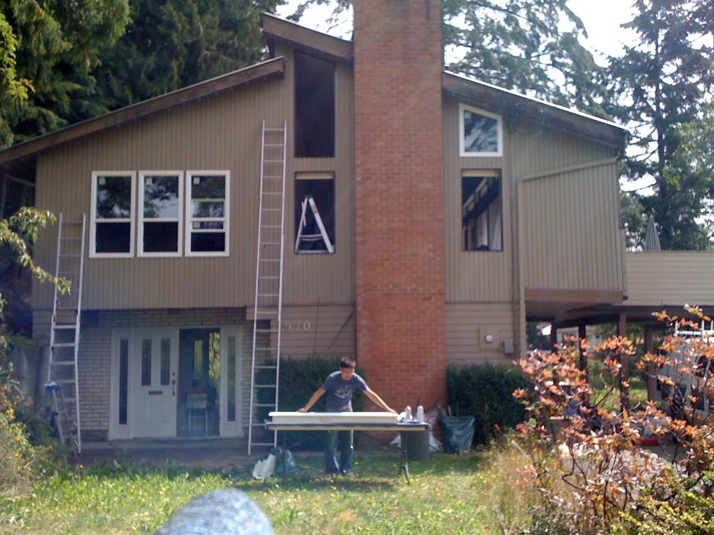 New windows for residential home. Installation of new windows required removal of old aluminum windows. New windows are energy efficient for Coquitlam home.