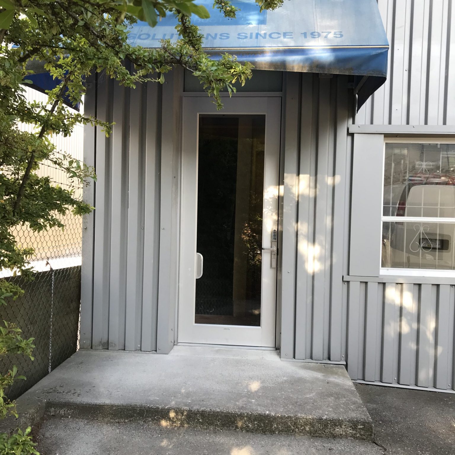 Commercial aluminum wide stile single swing door system with jamb