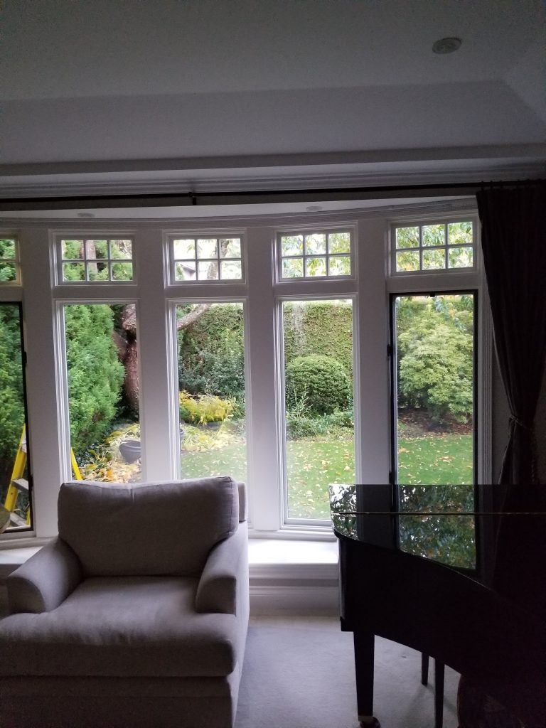 Cedar wood window frame replacing old windows that were all rotten
