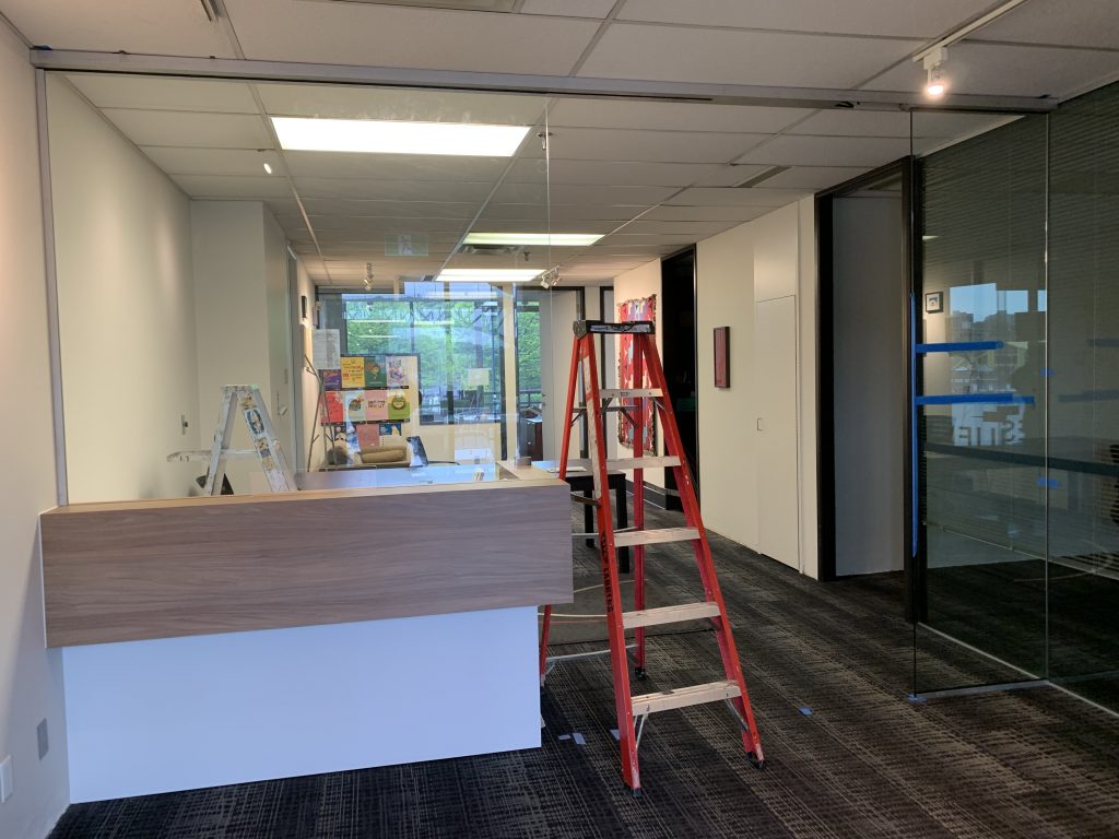 Commercial sidelite glass swing door with header full pane.