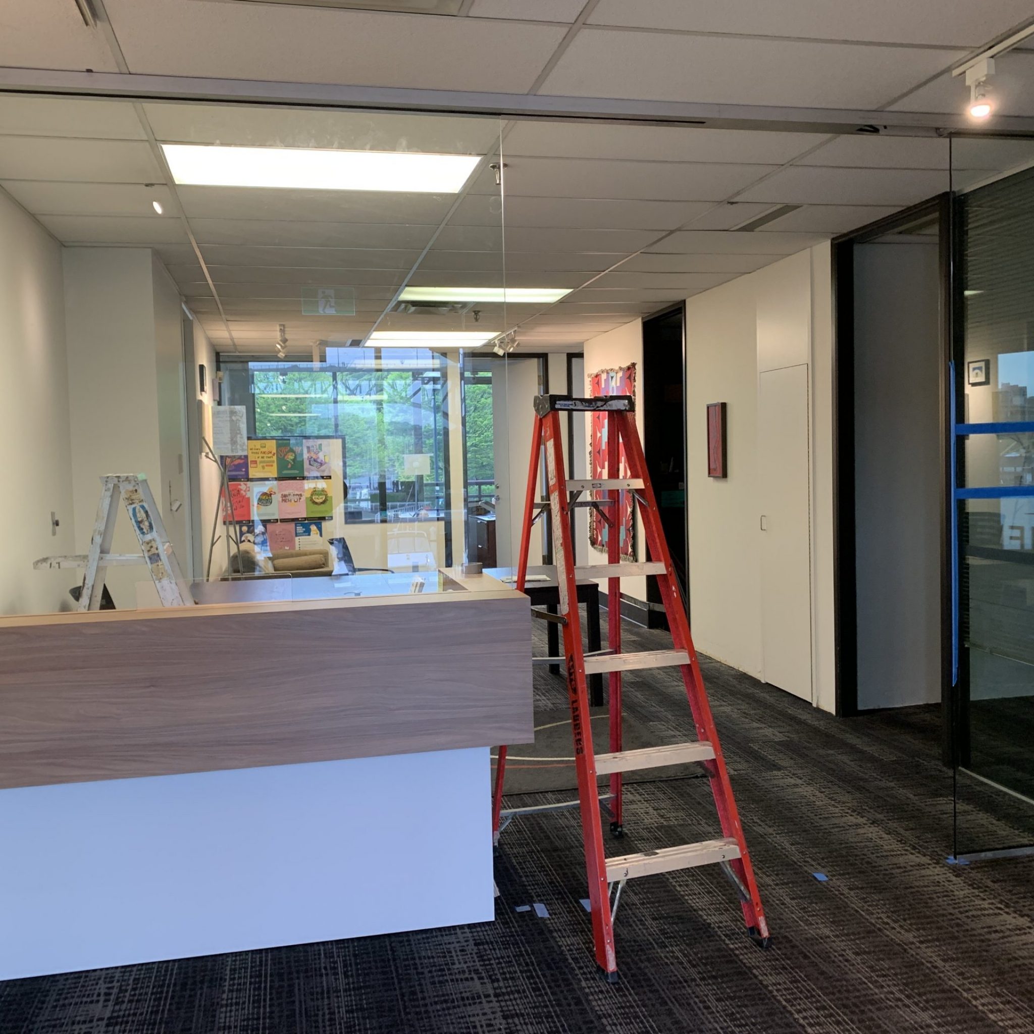 Commercial sidelite glass swing door with header full pane.