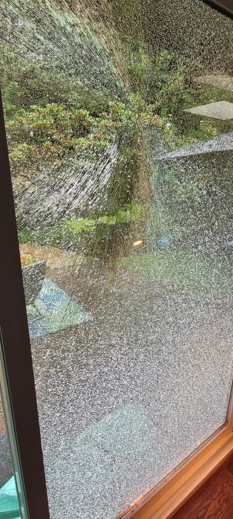 Shattered window glass requiring emergency glass repair